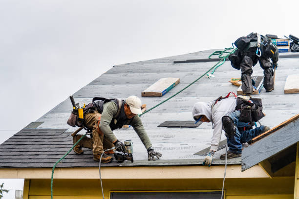 Professional Storm Damage Roof Repair technician working in Saint Michael, PA